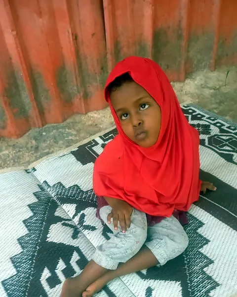Casho, age 8, at home in Banaadir