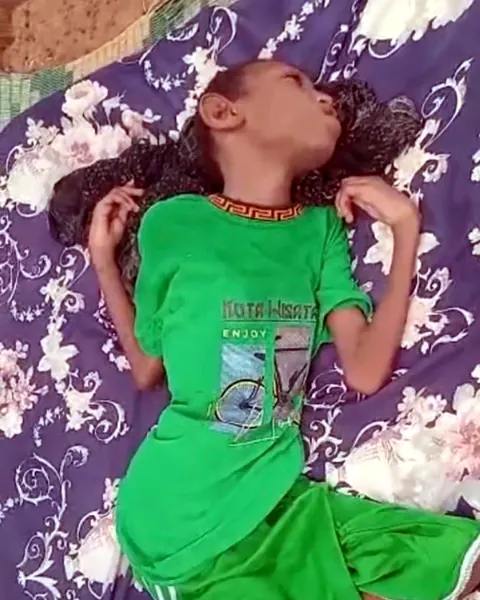 Maxamed, age 11, at home in Banaadir