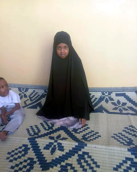 Rayaan, age 15, at home in Banaadir