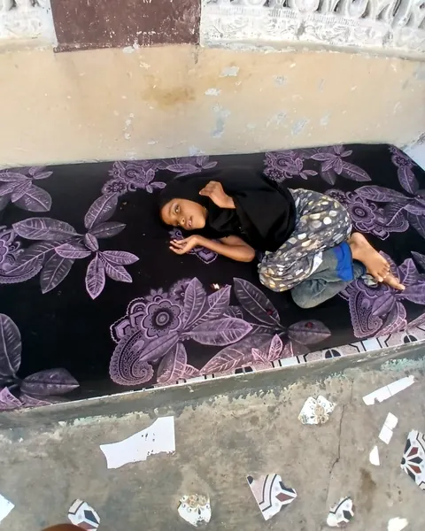 Ruqiyo, age 10, at home in Banaadir