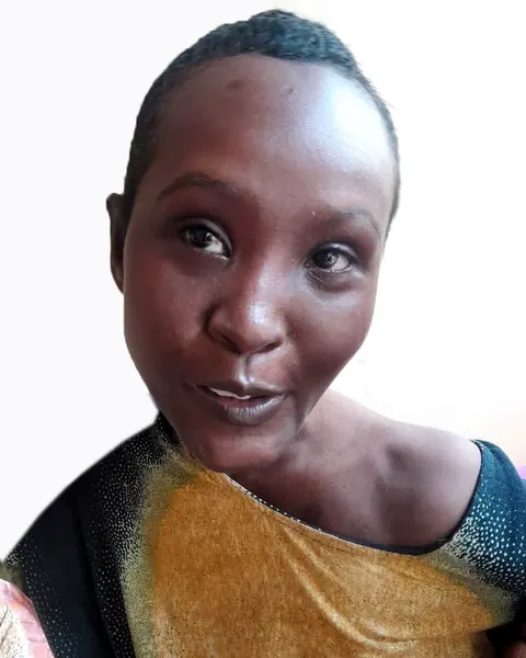 A woman smiling at the camera