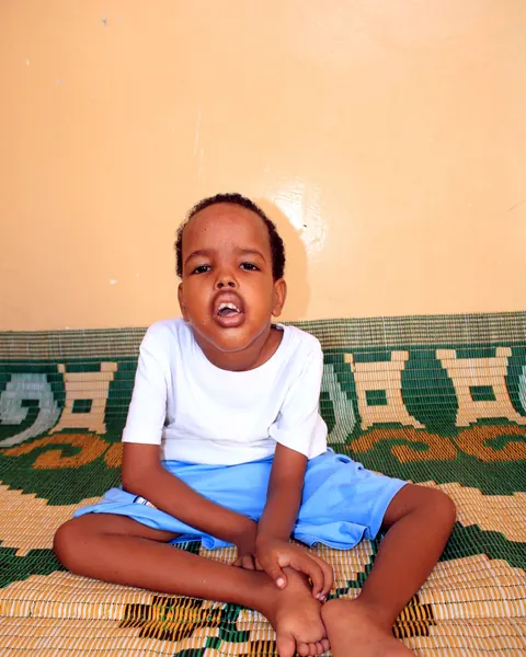 Xamze, age 7, at home in Banaadir